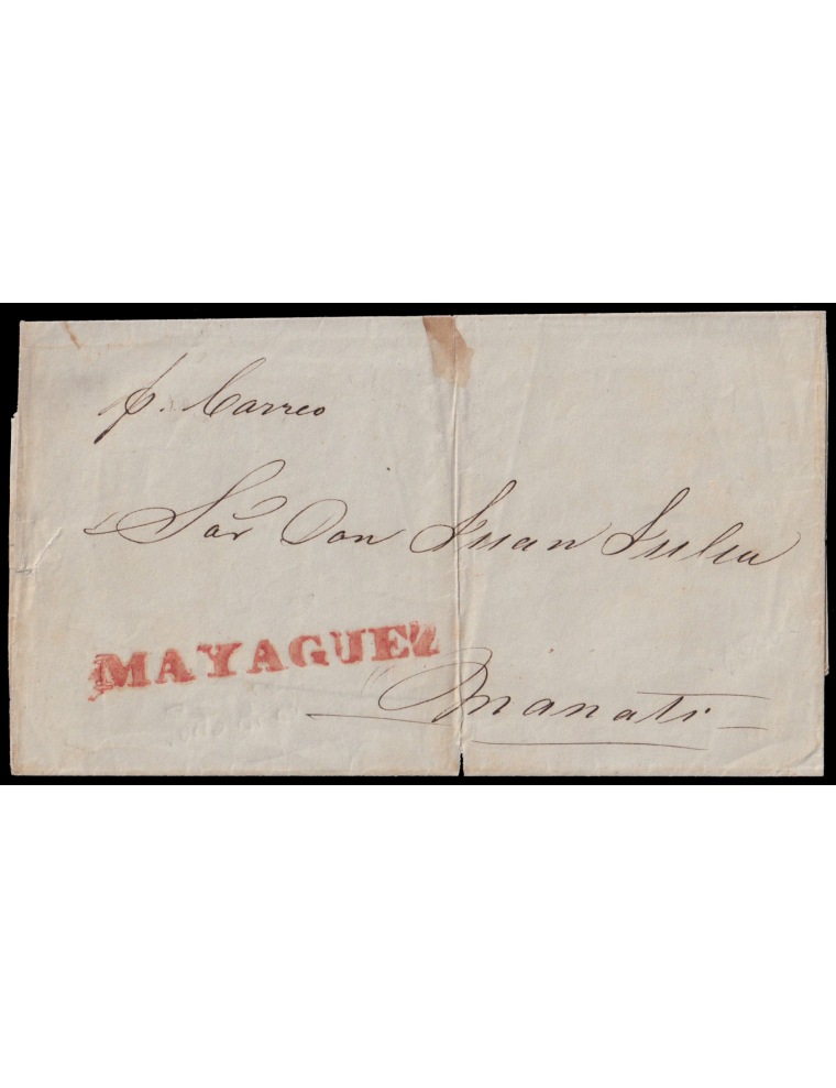 1845 circa. Mayagüez a Manatí. Marca “MAYAGUEZ” (n1) en rojo de Mayagüez. Mns. “P(or) Correo”. Muy interesante y rara envuelta. 